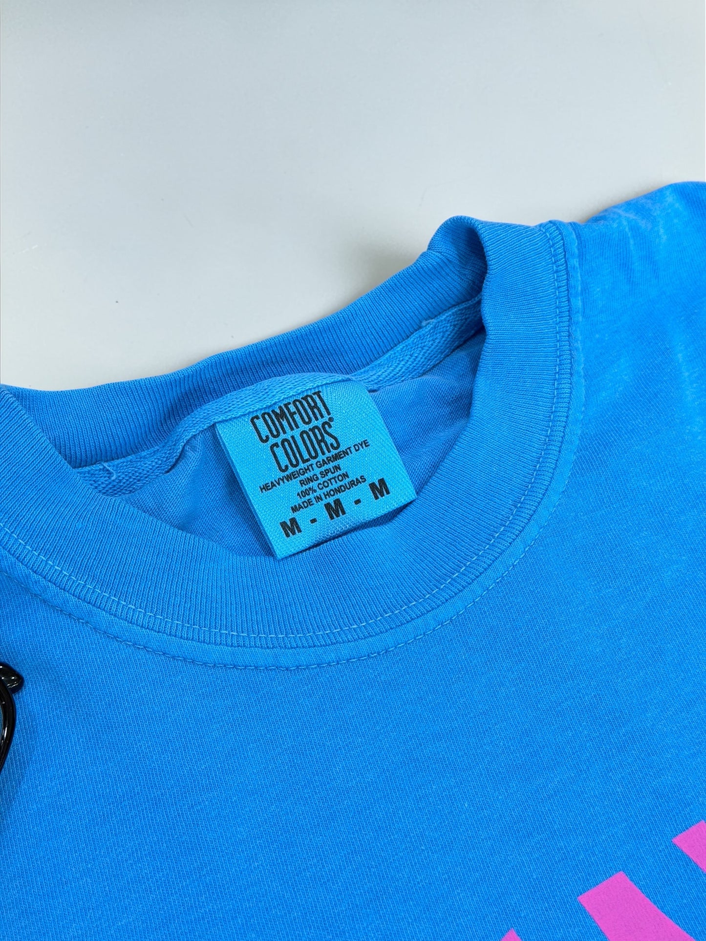 T's Tanning Hot Pink On Caribbean Blue Graphic T-shirt