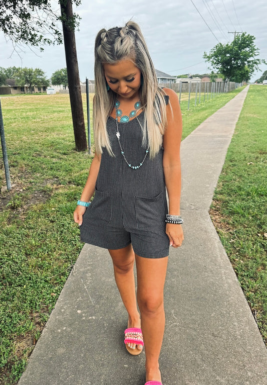 A lesson Learned Black Tie Romper