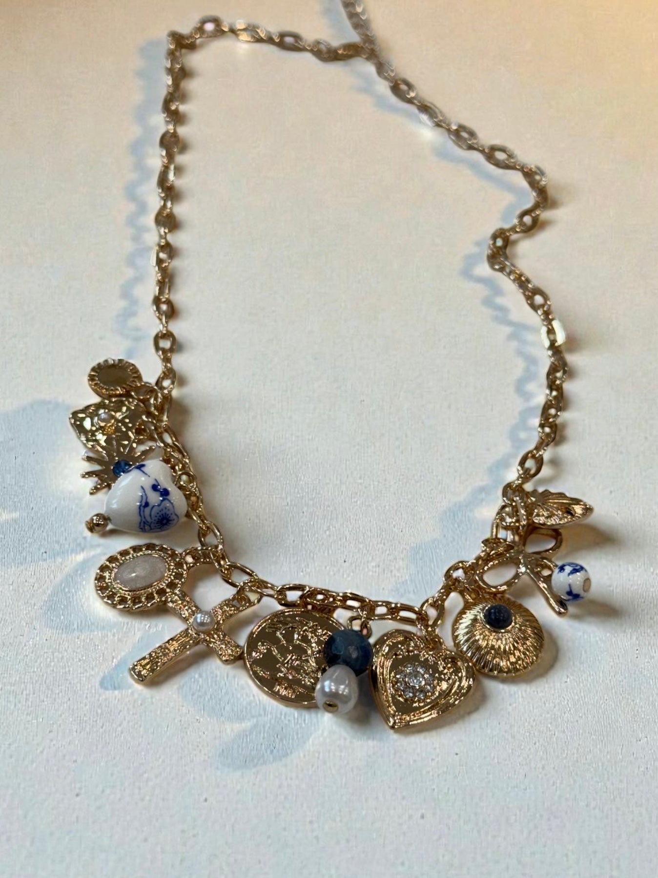 Radiant Embrace Charm Necklace