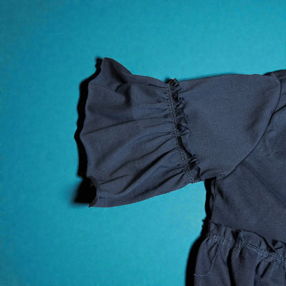 Ruffle Bloom V‑Neck Top